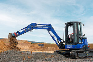 Bagger im Einsatz beim Fundament bauen